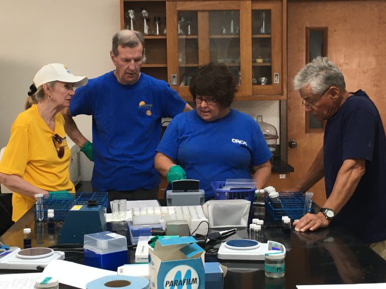 Dr. Beth Falls working with citizen scientists